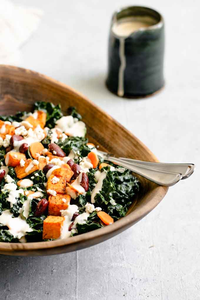 Kale Salad with Roasted Garlic Tahini Dressing • The Curious Chickpea
